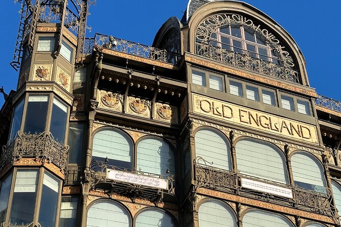 A Self-Guided Tour of Brussels: From Medieval to Modern Times - Shopping arcades, puppet tradition, and the elegance of Galerie de la Reine