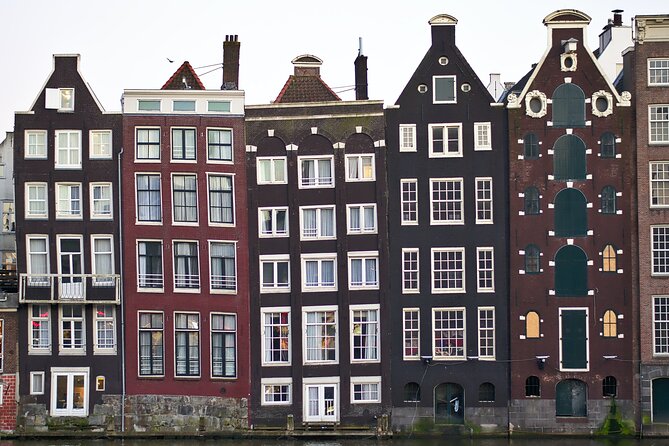 Amsterdam Day Trip from Brussels With Cheese, Clogs and Windmills - The Amstel River Photo Moment and What It Does for Your Day