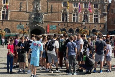Bruges by a Local: Exciting Stories, Mysteries, People and Choco - The Blind Donkey street and the dark side at Huidenvettersplein