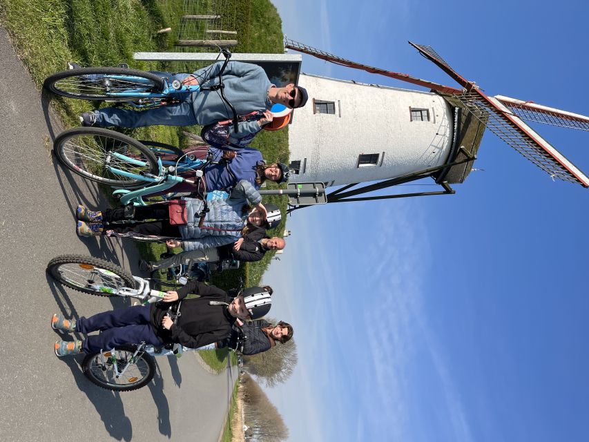 Bruges: Flatlands Guided Bike Tour - Key highlights you’ll feel right away