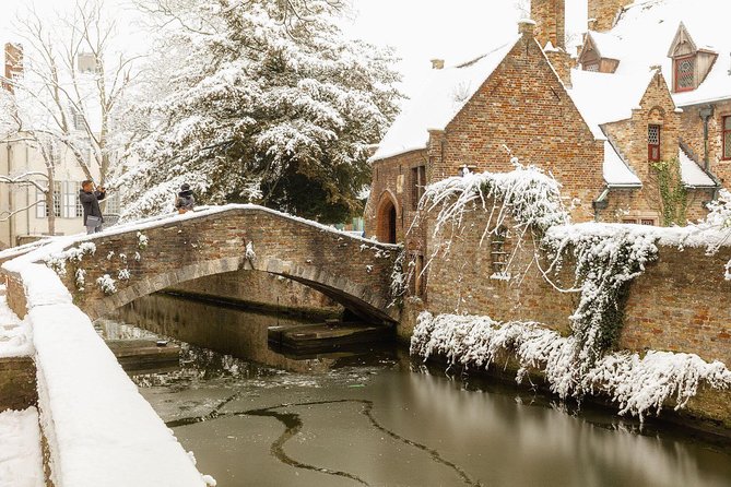 Bruges Uncovered: Historic Walking Tour & Canal Boat Experience - Burg Square and Stadhuis: The Political Heart of Old Bruges