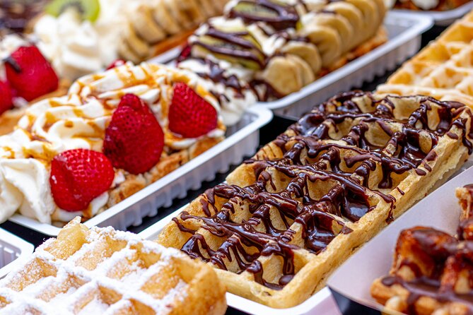 Brussels Walking Tour with Waffle Tasting: History and Delights - Royal Galleries and the included waffle break