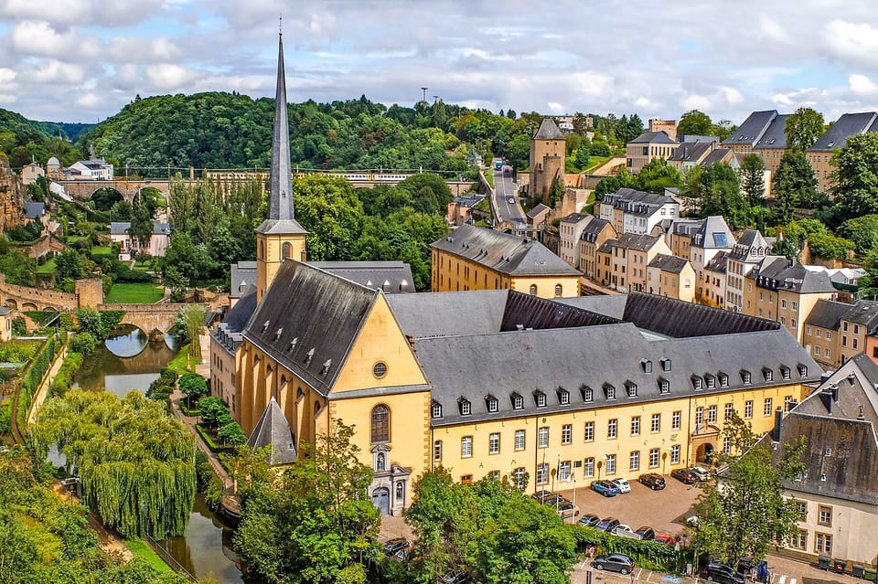 From Brussels: Guided Day Trip to Dinant and Luxembourg - Brussels bus ride to Dinant: how the day starts