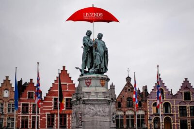 Historical Walking Tour: The Story of Bruges - by Legends - Start at Markt: The Red Umbrella Meet-Up Trick