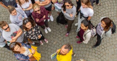 💛 Tell Me About Bruges 🏰 1000 Years of Stories by Locals ⭐ - Meeting on Market Square: the yellow umbrella plan